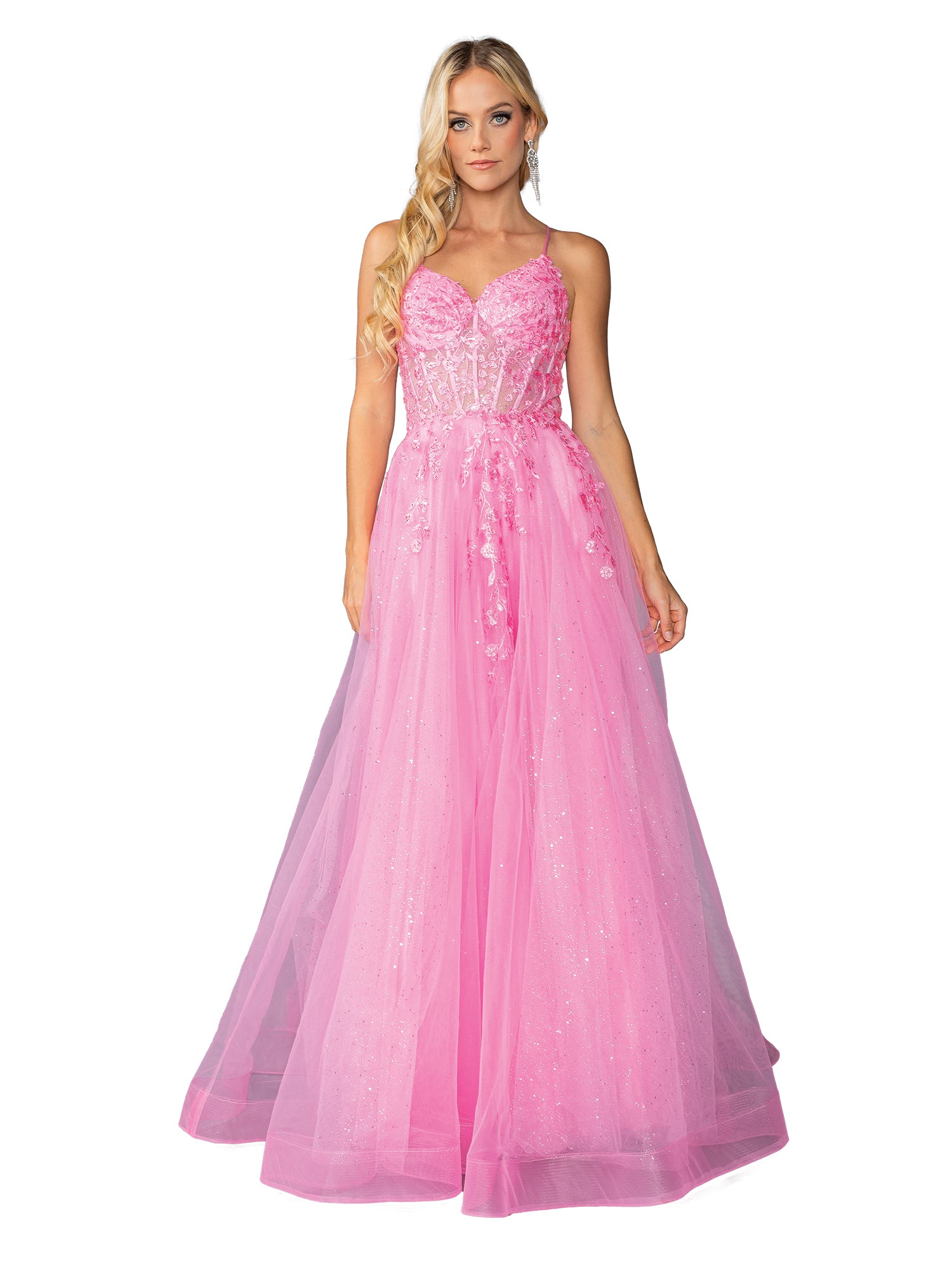 A woman stands against a white background wearing the Lace-Up Long Tulle Prom Ball Gown 4421, a floor-length pink evening dress with floral appliqué and strapless design.